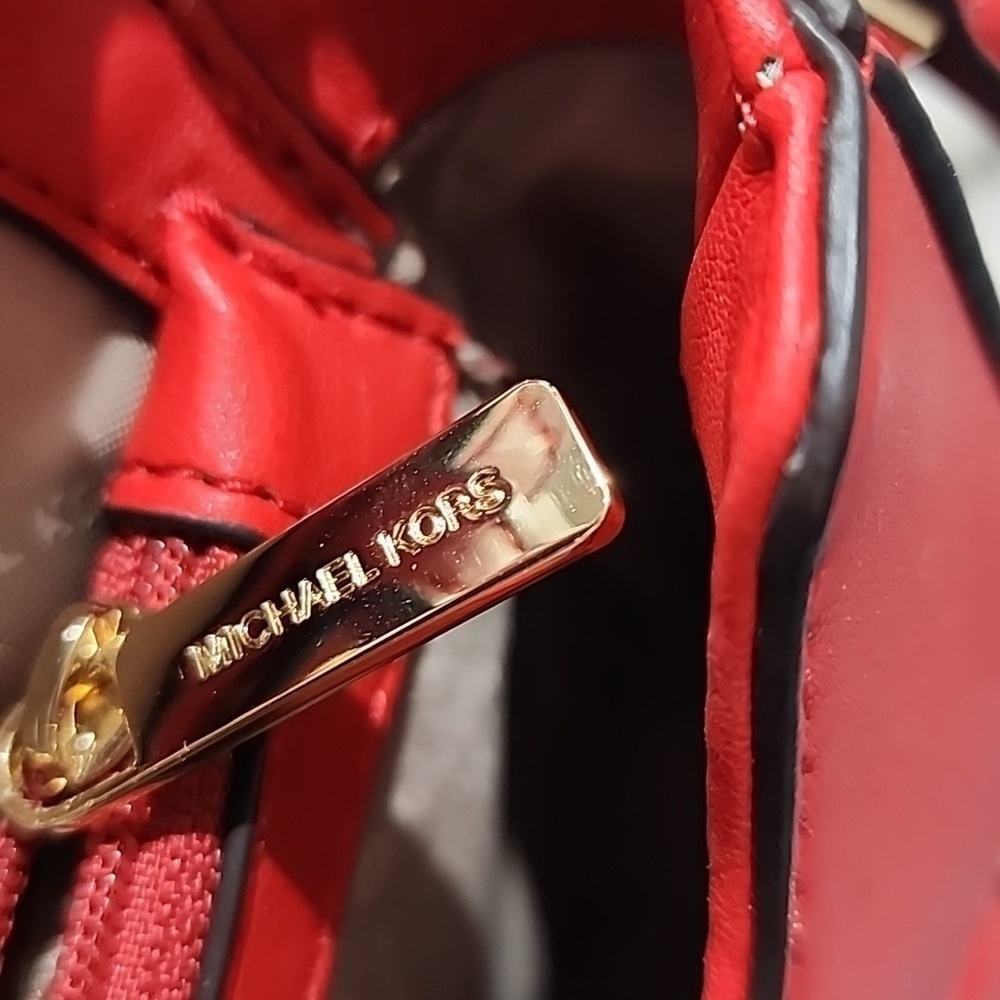 Gently used Michael Kors red leather crossbody bag. - Picture 9 of 12